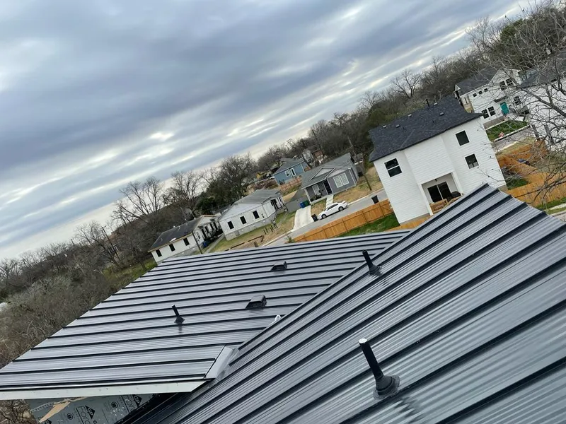 Standing seam metal roof panels with vents for Skylight Repair in Danvers